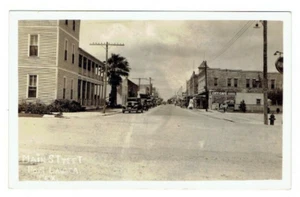 RPPC Main Street Port Lavaca Texas TX Postcard Autos Esso City Cafe Unposted - Picture 1 of 2