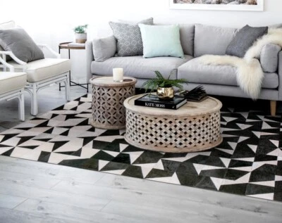 Handmade Hair-On Leather Patchwork Rug – Cowhide Area Carpet for Modern Home - Image 1 of 4