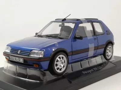 Norev Peugeot 205 GTi 1.9 with windowroof Miami blue 1992 1/18 184844 - Immagine 1 di 3