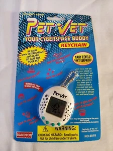Vtg *NIP* Pet Vet Cyberspace Buddy Puppy Dog Key Chain Digital Pet Randtoy 1997 - Picture 1 of 4
