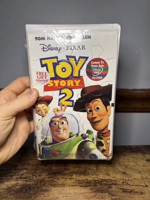 Toy Story 2 (VHS, 2000) Factory Sealed Walt Disney Pixar Clam Shell with Puzzle Foto 1 de 4