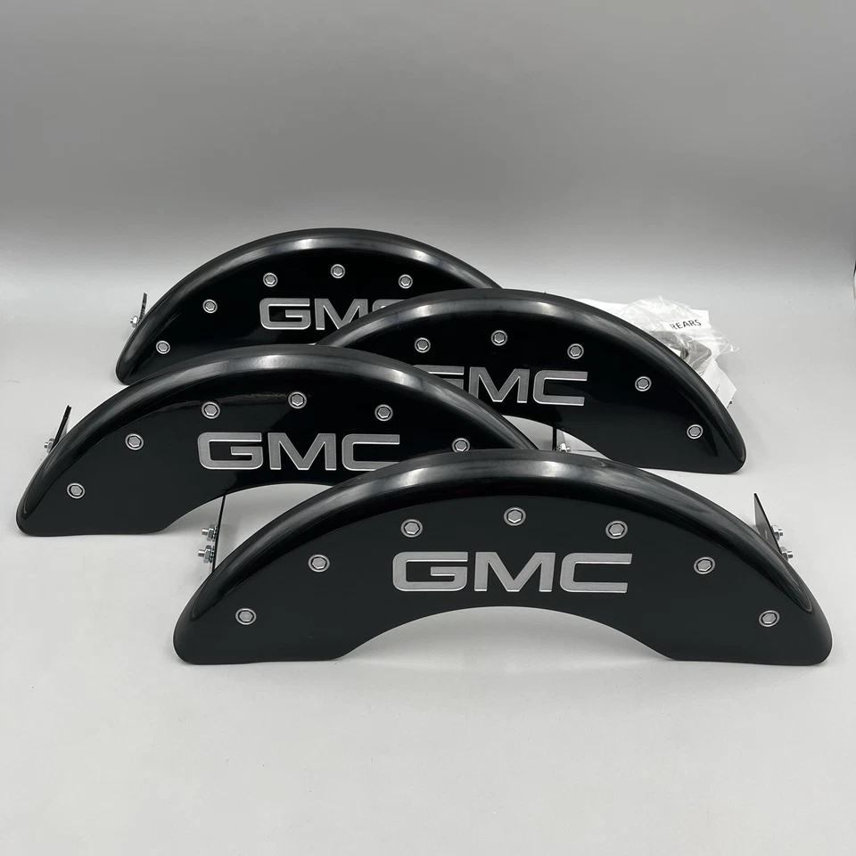 Cubiertas de pinza MGP 2011-19 GMC Sierra 2500 3500 HD negras y plateadas - 34003SGMCBK Foto 1 de 4