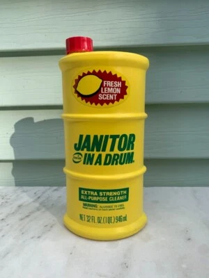 Botella amarilla Texize JANITOR IN A DRUM 65 % COMPLETA publicidad utilería de película de colección años 80 Foto 1 de 4