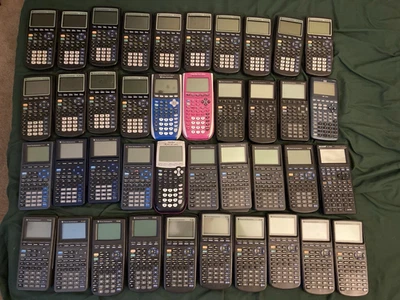 Lot of 40 Graphing Calculators mostly Texas Instruments - For Parts Or Repair - Image 1 of 4