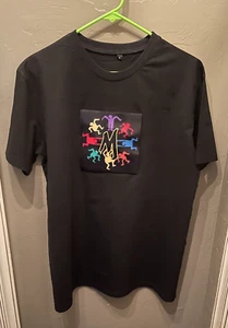 Camiseta De Colección Keith Haring NUEVA EDICIÓN MUSEO ILUMINA BRILLO EN LA OSCURIDAD - Imagen 1 de 3