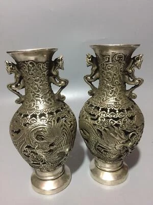 A Pair Old Tibet Silver Handwork Carved Dragon and Phoenix Hollow Vases - Image 1 of 4