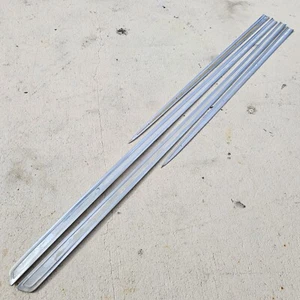 OEM 1964/64 Chevrolet Impala LH/RH guardabarros y cuarto trasero carrocería moldura - Imagen 1 de 12