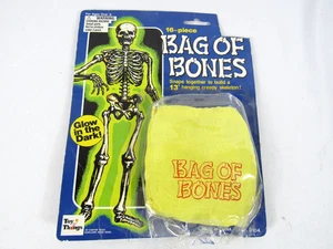 Bolsa de Huesos Juguetes N Things Versión Años 80 De Colección Juguete Corte Tarjeta Aplastada Esqueleto - Imagen 1 de 7