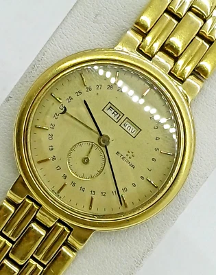 RELÓGIO MASCULINO VINTAGE ETERNA QUARTZO 255 CALENDÁRIO TRIPLO BANHADO A OURO NÃO FUNCIONA - Imagem 1 de 4