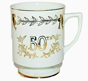 Taza 50 Aniversario con Patas con Hojas Doradas Campanas y Arcos De Colección Lefton Japón Nueva - Imagen 1 de 6