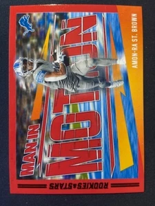 2023 Panini Rookies & Stars - Man in Motion Amon-Ra St. Brown #MM-1* - Picture 1 of 2