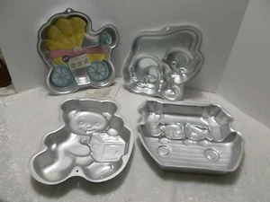 4 Wilton Baby Motiv Kuchenformen - Krabbel Baby - Baby Buggy - Arche Noah & Bär - Bild 1 von 11