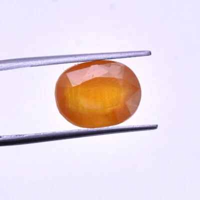 Piedra preciosa certificada corte ovalado de 13,70 mm*10,60 mm zafiro amarillo natural de 12,45 quilates Foto 1 de 4