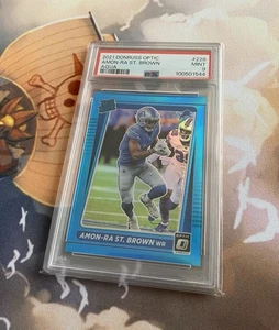 Amon-Ra St.Brown 2021 Panini Donruss Optic Rated Rookie Aqua Prizm RC /299 Lions - Bild 1 von 2