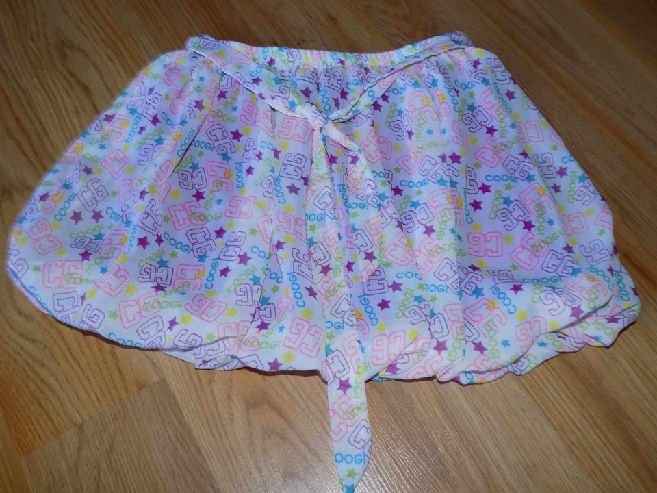 Minifalda COOGI con dobladillo de burbujas blanca magenta rosa estampado CG para niñas talla 6 usada en excelente estado Foto 1 de 4