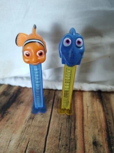 Lote 2 ~ DISNEY ~ Buscando a Nemo ~ Tallo de Cristal Dory y Nemo ~ CHINA - Imagen 1 de 9