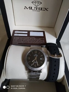 Schweizer Automatikuhr mit zweitem Armband.Garantie bis 01/27. - Bild 1 von 3