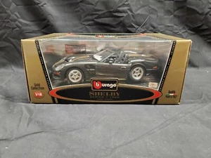 Burago 1:18 1999 Shelby Series 1 Black Gold Collectible NEW IN BOX. - Picture 1 of 5