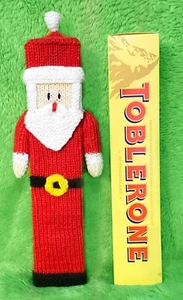 MOTIVO A MAGLIA - Portacopertura Toblerone ispirato a Babbo Natale 32 cm - Foto 1 di 1