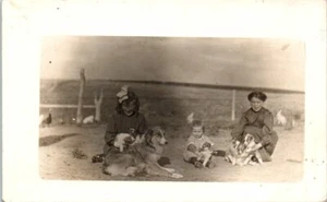 1904-1918 RPPC Photo Postcard Dogs Children Litter of Puppies Farm Chickens - Picture 1 of 2