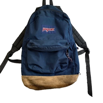 复古 Jansport 背包 皮革 底部 蓝色 1995 复古 90 年代 带棕色麂皮绒 二手状况完好 — 第 1/4 张图片