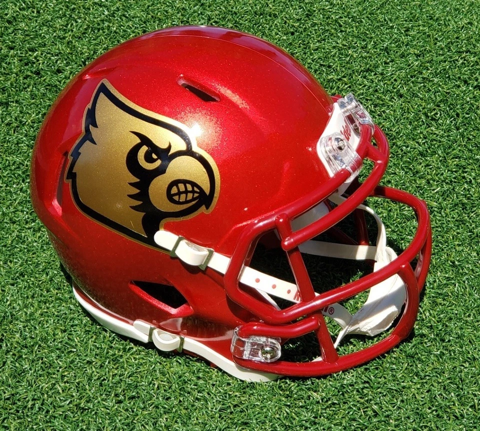 LOUISVILLE CARDINALS 2024 ALI TRIBUTE GOLD LOGO FOOTBALL MINI HELMET - Image 1 of 1