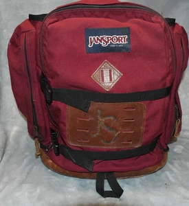 Mochila de día JanSport vintage con parte inferior y borde de cuero - Imagen 1 de 5