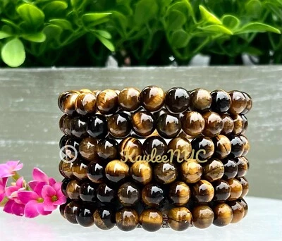 Wholesale 6 Pcs Natural Tiger Eye 8mm 7.5” Crystal Healing Stretch Bracelet - Image 1 of 4