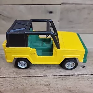 Giocattolo vintage Tootsie Jeep Ford Bronco giallo e verde pressofuso e plastica 1:32 - Foto 1 di 9