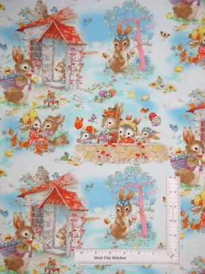 Conejo de Pascua Conejitos Escenas Tela Azul Colas de Conejo Algodón por Henry Glass Yard Foto 1 de 2