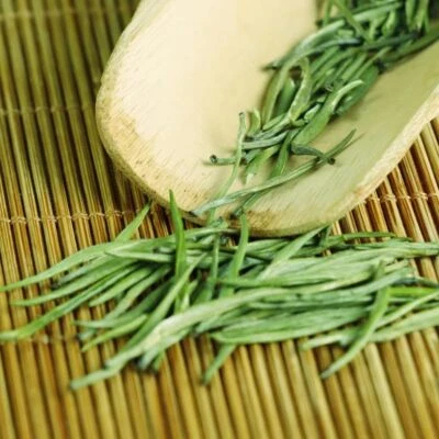 Té verde Zhu Ye Qing montaje alto QUE SHE hoja suelta gorrión lengua té 100 g Foto 1 de 4