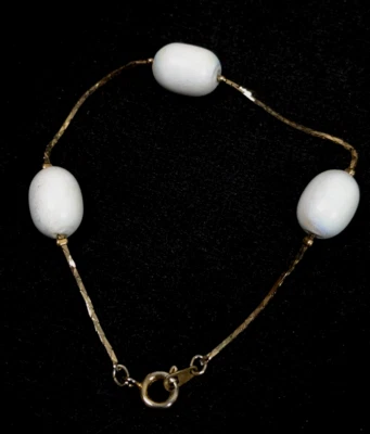 Vintage White Pearlized Oval Lucite Station Bead Gold Tone Thin Chain Bracelet - Image 1 of 4