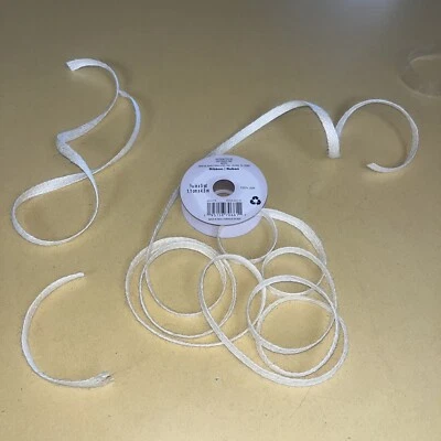 7/16" x 8’ & 2 Small Pieces 25” & 6”  Off White Jute Ribbon by Celebrate It. - Image 1 of 4