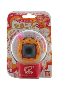 Super Life ¡Disfruta! Moji Moji naranja Tamagotchi Plus - Imagen 1 de 2