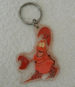 VINTAGE Disney SEBASTIAN From THE LITTLE MERMAID Plastic Keychain 1989 - Foto 1 di 4