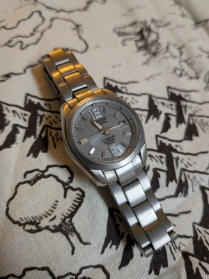 Citizen Eco Drive E011-5068479 титановый сапфир водостойкий 100 М - Изображение 1 из 4