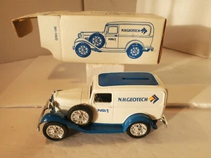 Vintage Diecast ERTL N.H. Geotech 1932 Pannello Consegna Banca 1:25 OB e Chiave - Foto 1 di 9