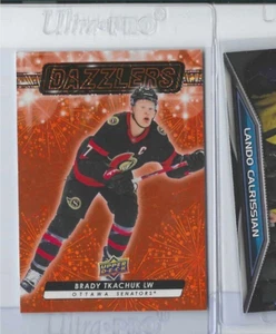 2023-24 Upper Deck Hockey Hockey Series 2 Brady Tkachuk Dazzlers Orange No DZ-89 - Picture 1 of 2
