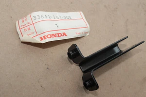Neu orig. Honda 33641-167-000 Blinkerhalter hinten für HONDA MT50 MT80 *NOS* - Bild 1 von 2