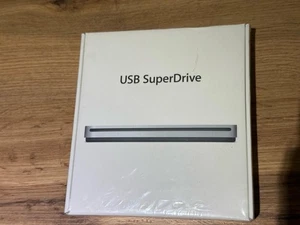 Apple USB Superdrive Napęd zewnętrzny CD DVD Nagrywarka Oryginalne opakowanie - Zdjęcie 1 z 3