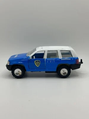 Unbranded Diecast Jeep Cherokee Police Blue/White 1:32ish Scale Pull Back ‘n Go - Image 1 of 4