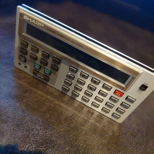 Sharp PC-1252H Pocket Controller Computer Used/Junk No Testing - Picture 1 of 2
