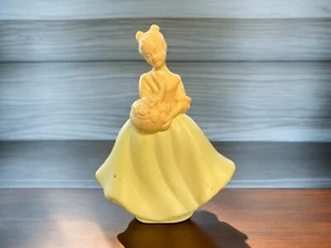 Parfum Flakon Eau De Cologne Avon Damen im gelben Kleid mit Blumenkorb - Bild 1 von 16