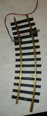 Piko #35270 Power Clamp w/Wires and 1 piece of track. (X9) - Image 1 of 3