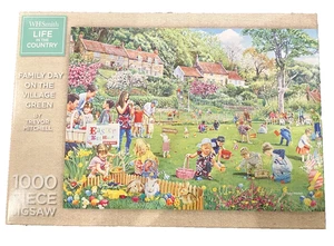 WH Smith Familientag im Dorfgrün von Trevor Mitchell Puzzle 1000 Teile - Bild 1 von 2