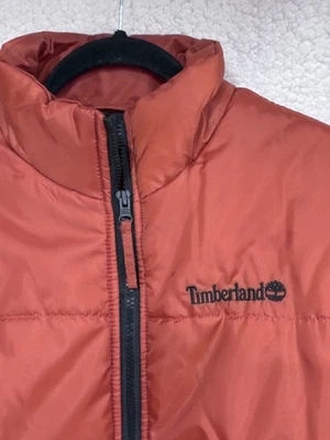 Abrigo de invierno para hombre Timberland (naranja quemado hinchado) (excelente estado) Foto 1 de 4