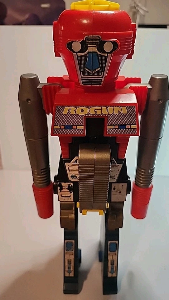 Figura transformadora de pistola robot pistola de juguete arco go bots 1984 de colección Foto 1 de 4
