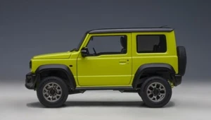 78506 AUTOart 1:18 Suzuki Jimny Sheller JB74 Yellow / Black Roof model car - Picture 1 of 8