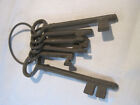 Decorative old fashioned cast iron skeleton keys or jailers keys on ring