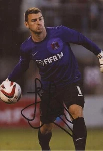 LEYTON ORIENT: JAMIE JONES SIGNED 6x4 ACTION PHOTO+COA - Picture 1 of 1